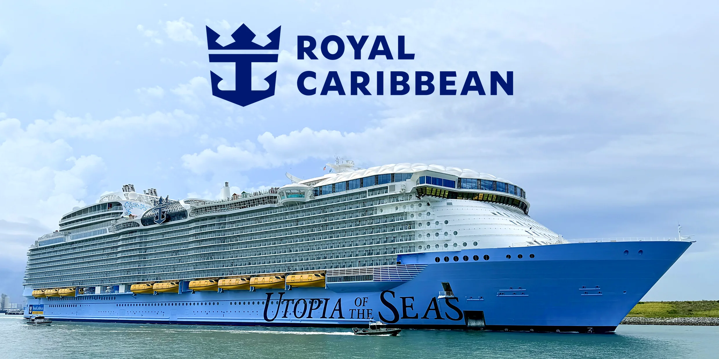 Royal Caribbean’s Utopia of the Seas sailing out of Port Canaveral under the Royal Caribbean logo