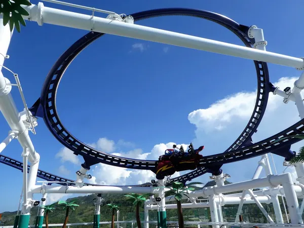 The blue loops of the BOLT roller coaster on the top deck of Mardi Gras