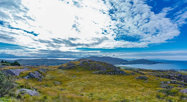 Green hills and coastline along the Ring of Kerry, Ireland