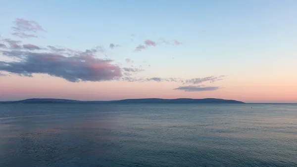 Wide view across Galway Bay toward County Clare