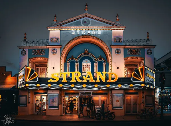 The colorful historic Strand Theater façade on Duval Street, Key West
