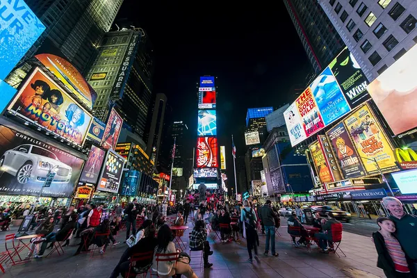 The bright billboards and crowds of Times Square at night