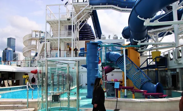 Twisting Aqua Park slides and the main pool on Norwegian Bliss