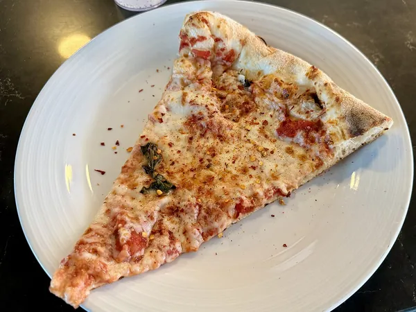 A fresh slice of pizza from Slice Pizzeria on Ruby Princess