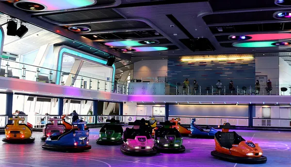 Bumper cars under neon lights at SeaPlex on Spectrum of the Seas