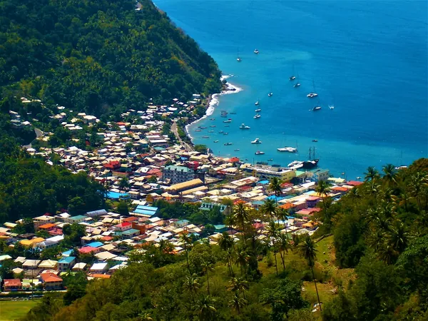 Soufrière town on the bay below green hills, Saint Lucia