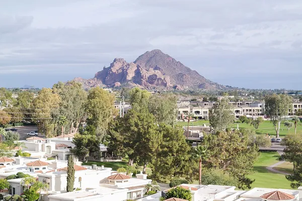 Camelback Mountain rising above homes and greenery