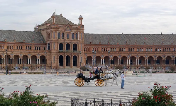 Historic architecture and palm trees in Seville, Andalusia