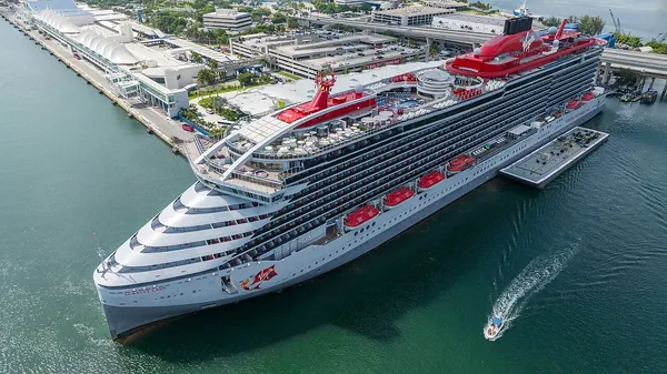 Scarlet Lady at PortMiami with the Miami skyline behind