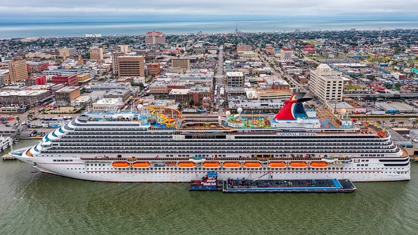 Carnival Breeze docked at the Port of Galveston, seen from above the harbor