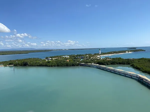 Aerial view of the lagoon and pier at Harvest Caye, Belize