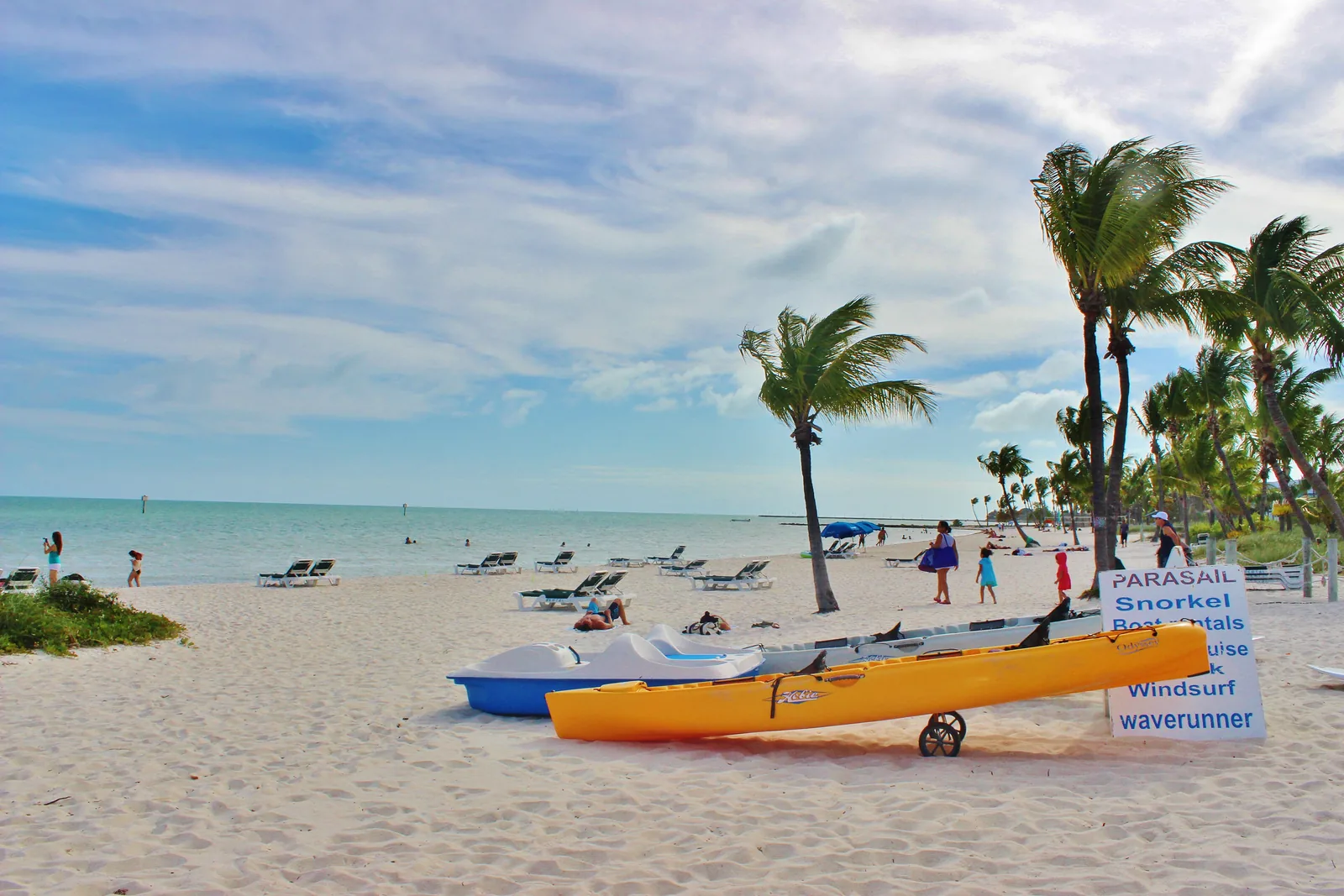 White sand, palm trees and turquoise water on a sunny beach in Key West, Florida