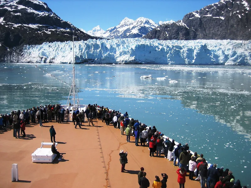 Cruise ship bow facing a tidewater glacier in Alaska