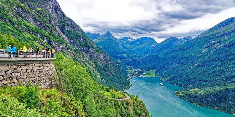 Steep green walls of the Geirangerfjord, Norway